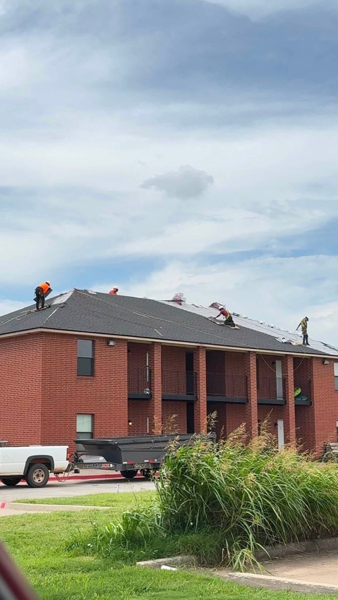 Vargas Roofing crew replacing a roof in Enid, Oklahoma